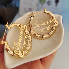 Custom Name 40mm-100mm Bamboo EarringsMATERIALSMetal Type: Stainless SteelPlating: Silver/Gold/Rose GoldSize: 60mm/70mmProduction time: 6-20 business daysNOTE: Please leave your chosen font/custom name prior to checkout. Follow the format below.Custom Name:Font#:If we do not receive your custom name request within 24 hrs. We will ship the product WITHOUT personalization. Bamboo Hoop Earrings, Name Earrings, Bamboo Earrings, Hoop Earrings Style, Big Hoop Earrings, Custom Earrings, Earrings Unique, Trendy Earrings, Rose Gold Earrings