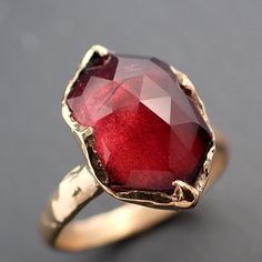 I created this setting in wax then cast it in recycled solid 18k Yellow gold at my home studio. This ring is a size 7 it can be resized up or down. The stone is a Rubellite tourmaline. it measures about 14mm X 9mm I created a rustic texture in the gold. The band is around 3mm. Throughout all time and history, in every tribe and culture all around the world crystals, minerals and gemstones have used for healing, luck, divination, adornment vibrational medicine and so much more. Vibrational Medicine, Pink Gemstones Ring, Gemstone Solitaire Ring, Red Tourmaline, Rough Diamond Ring, Raw Gemstone Jewelry, Rustic Texture, Rubellite Tourmaline, Yellow Gold Wedding Ring