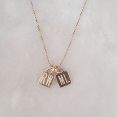 14 karat gold or sterling silver square charm engraved custom initials 14 karat gold fill or sterling silver ball chain in 16, 18, 20 inch lengths Dainty Initials Charm Necklace With Square Pendant, Dainty Charm Necklaces With Initials On Square Pendant, Engraved Initial Necklace With Square Pendant, Everyday Engraved Initial Necklace With Square Pendant, Engraved Square Pendant Initial Necklace For Everyday, Everyday Engraved Square Pendant Initial Necklace, Initials Charm Necklace With Square Pendant For Anniversary, Anniversary Charm Necklace With Initials On Square Pendant, Personalized Gold Rectangular Charm Necklace