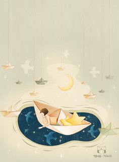 a paper boat floating on top of water with stars and crescents hanging from the ceiling