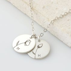 "Keep your little ones close to your heart with this Personalized Flower Necklace! It's great for layering, a wonderful minimalist piece, perfect gift for your wife, girlfriend, Mother's Day gift or simply to treat yourself! Engraved and hand assembled with care and love, it comes in 14k gold fill, rose gold fill, or sterling silver. HOW - TO - ORDER 1. Select your options from the drop down menu see photo for font styles and symbol options 2. Chain length options are 16\", 18\", 20\" & 22\" Minimalist Hand Stamped Charm Necklace As Gift, Minimalist Flower Pendant Jewelry For Mother's Day, Minimalist Hand Stamped Charm Necklace For Mom, Delicate Everyday Charm Necklaces For Mother's Day, Minimalist Personalized Flower Jewelry, Minimalist Flower Charm Jewelry Gift, Dainty Hand Stamped Necklace For Mom, Personalized Minimalist Charm Necklaces For Mother's Day, Minimalist Hand Stamped Necklace For Mom