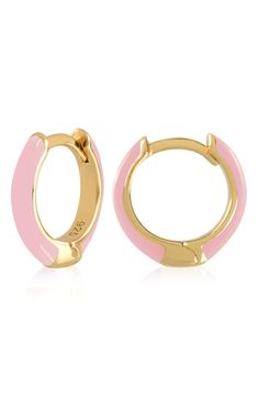 Easy-to-wear hoop earrings will add significant polish to even your most casual ensembles. 1/2" drop; 1/8" width Hinge with snap-post closure Sterling silver with goldtone plate/enamel Imported Light Pink Hoop Earrings, Everyday Gold Enamel Earrings, Trendy Hypoallergenic Enamel Earrings, Enamel Huggie Jewelry Gift, Trendy Gold Enamel Hoop Earrings, Trendy Enamel Earrings For Everyday, Everyday Round Enamel Earrings, Hoop Huggie Earrings In Enamel, Hinged Hoop Huggie Earrings