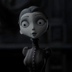 an animated character with big eyes wearing a black dress