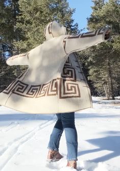 This thrifted, vintage Eaton's blanket is turned coat in a remarkable transformation!  Complete with real antler shed toggles, this coat is sewn to impress as a 100% unique item!  Don't like the beige outside?  No problem, the seams have been sewn in such a way to make it reversible!  Stand out at your cabin, on the ski hill, or traipsing around the city with this looker of a coat! Designed to be a baggy fit, this coat will nicely fit anyone from a size 6 jean to a size 16! Don't second guess this purchase, there is only ONE to go around! Nordic Wool Outerwear For Cold Weather, Nordic Style Wool Outerwear For Cold Weather, Ski Hill, Blanket Coat, Baggy Fits, Size 16, Jackets For Women, Cabin, Jackets & Coats