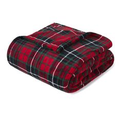 the red and black plaid blanket is folded on top of each other, with two matching blankets