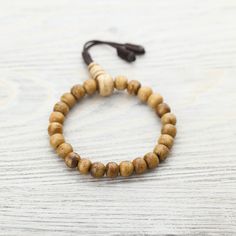 Made in Nepal, this traditional wrist mala bracelet features naturally stained water buffalo bone beads with a matching guru. They serve as a reminder to live in the present moment; because nothing is permanent, everything is possible. Because the beads are naturally stained, the color can begin to fade over time and with use. We consider this special process to be a visual representation of the growth in your practice and a further reminder of impermanence. Pair it with the matching Traditional Nothing Is Permanent, Buddhist Practices, Nothing Lasts Forever, Wrist Mala, Bone Jewelry, Water Buffalo, The Present Moment, Live In The Present, Present Moment