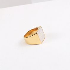 This 18K Gold Plated Large Square Mother-of-Pearl Ring is a luxurious, statement-making piece. Featuring a chunky gold band with both mother-of-pearl and black onyx accents, it's the perfect unique gift for any special occasion. This signet ring is also an ideal stacking ring for daily wear. [MATERIAL]: Yellow brass with real 18k gold plated. Our ring will not tarnish or turn green.[PLEASE NOTE]: Each shell color is unique so the shade and color might slightly vary. Elegant Gold Rings With Mother Of Pearl, Gold Mother Of Pearl Ring For Gift, Gold Mother Of Pearl Rings For Anniversary, Gold Mother Of Pearl Anniversary Rings, Gold Mother Of Pearl Ring As A Gift, Modern Gold Jewelry With Mother Of Pearl, Clean Sterling Silver, Shell Color, Wide Band Ring