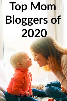 a woman and her baby are looking at each other with the words top mom bloggers of 2020