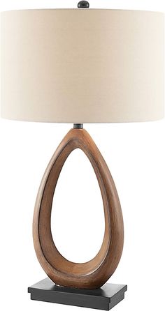 a wooden table lamp with a white shade on it's base and a black metal base