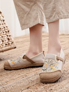 Radiate beachy vibes with every step wearing this slip-on espadrille that showcases a stripe motif and cross-strap. A rubber sole keeps your footing sure as you navigate slippery terrain. Slip-on Canvas linen upper Man-made lining Natural straw mat breathable insole Rubber sole Comfortable Slip-on Espadrilles For Summer, Spring Bohemian Flats With Round Toe, Bohemian Spring Flats With Round Toe, Bohemian Round Toe Flats For Spring, Spring Embroidered Round Toe Espadrilles, Flat Espadrilles For Spring And Summer, Casual Embroidered Espadrilles For Spring, Embroidered Summer Flats, Casual Flat Embroidered Espadrilles