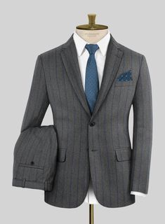 Enhance your appearance with our Loro Piana Antonella Wool Suit, showcasing a refined sense of elegance that defines your classy look. Meticulously crafted from pure wool fabric, The suit displays a polished stripe motif featuring a harmonious interplay of gray and distinguished blue hues. This amalgamation exudes an ageless charm, elevating it to the status of a true sartorial masterpiece. Whether you're attending a formal office meeting or a refined dinner event, this suit is designed to ensur Elegant Tailored Pinstripe Sets, Striped Double Breasted Suit For Semi-formal Occasions, Elegant Wool Suits With Custom Fit, Elegant Custom Fit Wool Suit, Elegant Single Breasted Wool Suit, Fitted Pinstripe Elegant Set, Elegant Wool Suit With Welt Pockets, Elegant Pinstripe Suit With Suit Collar, Elegant Wool Suits With Welt Pockets