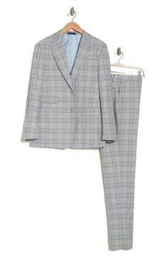 Sophisticated peaked lapels smarten the jacket of this trim-fit suit paired with flat-front trousers and finished in a handsome plaid print. 36 1/4" inseam; 7 3/4" leg opening; 10 1/2" rise (size 38R) Jacket has peaked lapels; chest welt pocket; front flap pockets Unhemmed Lined 70% polyester, 28% rayon, 2% spandex Dry clean Imported Single Button Tuxedo Sets For Workwear, Fitted Business Casual Sets With Lapel Collar, Tuxedo Suit With Suit Collar For Work, Chic Business Suits With Notch Lapel, Workwear Sets With Suit Collar And Single Button, Business Casual Pantsuit With Pressed Crease, Workwear Sets With Single Button And Suit Collar, Single Breasted Fitted Sets For Workwear, Fitted Single Breasted Sets For Workwear