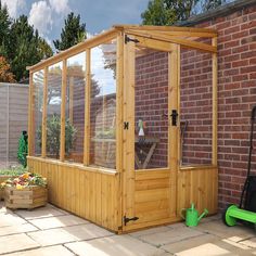 a small backyard with a large wooden structure