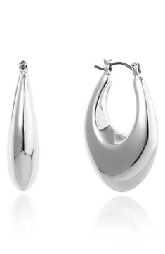 Slender teardrop-shaped hoops offer contemporary appeal to a classic jewelry staple. 1 1/4" drop; 7/8" width Snap-post closure Silvertone plate Imported Elegant Teardrop Hoop Earrings With Polished Finish, Modern Nickel-free Teardrop Pendant Jewelry, Teardrop Hoop Earrings With Polished Finish For Formal Occasions, Teardrop Hoop Earrings With Polished Finish For Formal Events, Sterling Silver Teardrop Hoop Earrings With Polished Finish, Metal Jewelry With Shiny Teardrop Finish, Metal Teardrop Jewelry With Shiny Finish, Teardrop Metal Jewelry With Shiny Finish, Modern Polished Teardrop Earrings