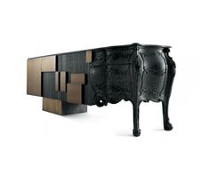 the sideboard is made out of black wood and has an intricate design on it