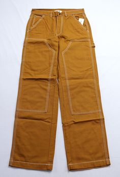 Urban Outfitters Women's BDG Canvas Carpenter Pants EJ2 Brown Size 27 New with tags Waist (across): 14" Inseam: 31" I strive for excellence in customer service and to create and maintain a reputation of trust with customers Please feel free to ask any question that you have, before and after the auction ends Customer service hours are Monday-Friday 8AM-4PM and we will generally respond to you within 24hrs. I will do my best to make your transaction as smooth as possible Fast free shipping Shipping to verified paypal address only Returns will not be accepted if tags have been removed 100% Satisfaction Guarantee Be sure to check my store regularly, as new items come in daily Don't miss your opportunity on this item; if you decide to buy later it might be gone! Loc: 941 EJ2 Contrast Stitching Cotton Cargo Jeans For Work, Workwear Cargo Jeans With Contrast Stitching, Urban Outfitters Straight Leg Bottoms For Streetwear, Cotton Bottoms With Contrast Stitching, Urban Outfitters Straight Leg Streetwear Bottoms, Urban Outfitters Cotton Pants, Urban Outfitters Wide Leg Pants For Streetwear, Urban Outfitters Cotton Bottoms With Side Pockets, Urban Outfitters Straight Leg Cotton Bottoms