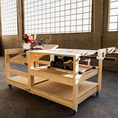 a workbench with some tools on it in an industrial building or office area