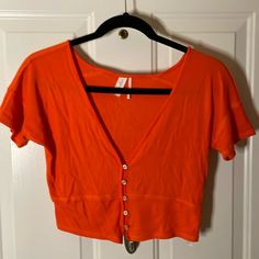 Nwot Out From Under Viscose/Elastane Short Sleeve, V-Neck, Button Up, Crop Top, Orange, Size L Trendy V-neck Top With Buttons, V-neck Tops With Buttons, Summer V-neck Tops With Buttons, V-neck Tops With Button Closure For Day Out, V-neck Top With Buttons For Day Out, Orange V-neck Top With Buttons, Orange Tops With Buttons For Day Out, Color Orange, Urban Outfitters