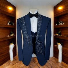 Sophistication has a new name in this bespoke, 3-piece navy blue tuxedo suit, fully tailored in Italy from the finest handmade fabrics made to specification, to have you exquisitely detailed for that occasion at all times. Design: Glimmering Design Handwork: It was the detailed, hand-stitched embellishments that set this tuxedo above the ordinary into the realm of pure glamour, making one set apart. Shawl Lapel with Handwork: The lapel is luxuriously designed as a shawl with meticulous handwork, Royal Blue Coat Pant Men, Handwork Tuxedo For Men, Blue Coat Pant Men, Blue Coat Pant, Best Wedding Suits For Men, Navy Blue Tuxedo, Tuxedo Suit For Men, Royal Blue Coat, Navy Blue Tuxedos