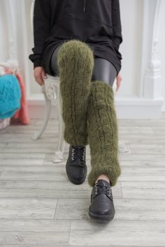 "Hand knit 2 strands qualuty bruch mohair Legwarmers DETAILS - Made from Premium mohair - The model is 170 cm tall (regular S) - The sweater on picture is one size - As mostly all models in our shop the sweater is loose fit - Color on photo -green FOR MORE For all our listings visit - https://www.etsy.com/shop/MOLIMARK For more Knit Sweaters READY TO SHIP visit - https://www.etsy.com/shop/MOLIMARKS?ref=seller-platform-mcnav§ion_id=28201384 For more Wool Sweaters visit - https://www.etsy.com/shop Winter Soft Knit Fitted Knitting Pattern, Fitted Soft Knit Winter Knitting Pattern, Cozy Fitted Knitting Pattern, Soft Knit Leg Warmers For Winter, Cozy Fitted Hand Knitted Pattern, Cozy One Size Cable Knit Leg Warmers, Handmade Winter Knitting Pattern One Size, Cozy One-size Cable Knit Leg Warmers, Winter Acrylic Knitting Pattern