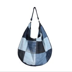 a large blue and black bag on a white background