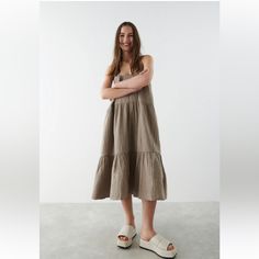 100% Organic Cotton Gauze Tiered Dress. Size Medium Casual Linen Midi Dress For Brunch, Relaxed Fit Summer Midi Dress With Ruffles, Relaxed Fit Midi Dress With Ruffles For Summer, Summer Midi Dress With Ruffles Relaxed Fit, Casual Neutral Summer Dress, Casual Neutral Dress For Vacation, Casual Neutral Cotton Midi Dress, Casual Linen Dress With Ruffles, Summer Midi Dress With Relaxed Fit For Casual Occasions