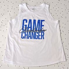 a white tank top with the word game changer printed in blue on it and polka dots