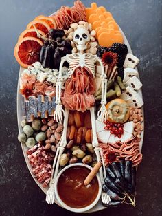 a plate full of food that looks like a skeleton