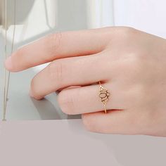 Few things evoke peace, strength and love more than the lotus. These delicate rings can be worn on any finger or on a toe. They come in three colors and 4 sizes. Get yours today. Sizes 6 1/2, 7 1/2, 9, 10 Properties: Lotus Flower: a symbol of purity, enlightenment, self-regeneration and rebirth.Stainless Steel: protection from psychic attacks, extreme negativity; adds strength; is hypoallergenic Lotus Flower Ring, Psychic Attacks, Lotus Ring, Flower Rings, The Lotus, Love More, Delicate Rings, Stainless Steel Rings, Rose Gold Color