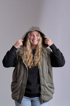 Stay warm and on-trend with our new and improved Hooded Puffer Vest! With its plush, insulated design and cozy removable hood, this vest is ideal for outdoor adventures. Layer it over any top for extra warmth without sacrificing style. Available in classic Army Green or Black, it's the go-to layering piece for chilly weather outings. Material + Wash Shell: 100% Cotton Lining: 100% Cotton Machine Wash Cold with Like Colors on Delicate Cycle Non-Chlorine Bleach when Needed Tumble Dry Low Heat Warm Academy Uniforms, Hooded Puffer Vest, Boys Swim, Chilly Weather, New And Improved, Pullover Jacket, Jogger Sweatpants, Puffer Vest, Outdoor Adventures