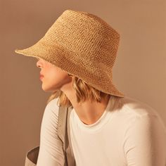 Crochet Bucket Hat made from soft woven raffiaAdditional Information:• Material: 100% Raffia• Measurements: Crown: 4", Brim: 3"• One size fits most Crochet Sun Hat, Crochet Bucket, Crochet Bucket Hat, Woven Raffia, Crochet Hat, Hat Making, Sun Hats, Bucket Hat, Hobbies