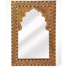 an ornate wooden mirror on a white background