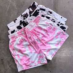 Pink Athletic Shorts With Built-in Shorts For Summer, Pink Athletic Shorts With Built-in Liner For Summer, Pink High-waisted Athletic Shorts With Built-in Shorts, Pink Bottoms With Built-in Shorts Above Knee, Trendy Athletic Shorts For Summer, Fitted Pink Shorts For Beachwear, Pink Summer Athletic Shorts, Trendy Pink Stretch Athletic Shorts, Casual Pink Shorts With Short Inseam