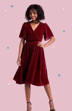 In a rich, beetroot red hue, this fluttery and flow-y velvet midi dress makes crossing the room look like a beautiful dance. Made from a stretchy velvet fabric with a gorgeous sheen and a plush texture, this effortlessly elegant midi dress boasts short flutter sleeves, a surplice neckline, and a gathered high-rise waistline that gives way to a drapey and dreamy A-line skirt. Fit And Flare Dress Casual, 40s Dresses, 50 Dress, Cocktail Dress Classy, Elegant Midi Dress, Beautiful Dance, Fashion 70s, 70s Outfits, Valentines Day Dresses