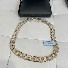 Absolutely Stunning!! Gorgeous Gold Its New With Tags And Comes With Box Product Details Chain Type: Curb Chain Width: 12 Mm Metal: Brass Plating: 14k Gold Finish: Polished Packaging: Boxed New In Box Ships Same Day 14k Gold Silver Necklace With Curb Chain, Silver Cuban Link Necklace In 14k Gold, 14k Stamped Cuban Link Necklace For Gift, 14k Stamped Cuban Link Necklace As Gift, Stamped 14k Cuban Link Necklace As Gift, Stamped 14k Cuban Link Necklace, Formal 14k Stamped Cuban Link Necklace, Stamped 14k Link Chain Necklace Gift, 14k Link Chain Necklace As Gift