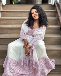 Experience the elegance of this gorgeous light color Habesha dress, showcasing a very beautiful design. This stylish Habesha Kemis and Ethiopian Traditional Dress effortlessly blends traditional grace with modern sophistication, making it perfect for any special occasion. Material Cotton Thread Menen Estimated delivery : 2 weeks to 3 weeks Contact WhatsApp +1(304)-306-2784Email: contact@ethiopian.store Zuria Habesha Dress, Ethiopia Clothing, Traditional Dress Design, Habesha Clothes, Ethiopian Clothing, Habesha Dress, Ethiopian Traditional Dress, Ethiopian Dress, Habesha Kemis