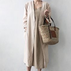 Elegant and breezy, our Longline Linen Cardigan is an essential for summer layering. The light linen fabric will keep you cool yet covered, and the loose fit is certain to provide maximum comfort. Wear over lightweight trousers and a summery top for the perfect casual look. Loose Cardigan, Loose Coats, Gilet Long, Stitch Shirt, Casual Cardigans, Cardigan Long, Retro Women, Trench Coats Women, Back To Basics