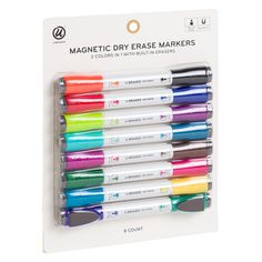 the magnetic dry erase markers are set up in a display box with four different colors