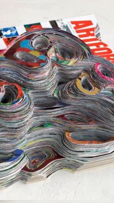 a stack of magazines sitting on top of each other