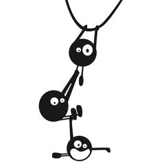 two black and white stickers hanging from a rope with one holding the other's head