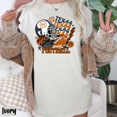 Longhorn Collage Tshirt UT Fan Gift Gameday Tee for Family Orange and White Tshirt UT Football Tee Hook Em Tee Team Spirit Gift for Longhorn Introducing our stylish and unique T-shirt that is perfect for UT, Texas-lovers and fashion enthusiasts alike! This trendy piece features a bold combination of textures and designs. Adorned with a Collage of all things Longhorn and UT, this shirt showcases your love for UT in a fierce and fashionable way. Made from comfortable and soft fabric, this T-shirt Collage Tshirt, Ut Texas, Ut Football, Spirit Gifts, Football Tee, Unique T Shirt, Football Tees, Unique Tshirts, Football Shirts