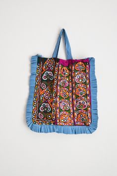 "Welcome to HarmonyHandicraftCo A very beautiful hand embroidered vintage Kutchi Banjara Bag. It has Both side fully Embroidery. This bag is from the Banjara tribal people with mirror embroidery and decorated with tassely pompom all round which makes it very attractive. Vintage Handmade Kutchi Bag, Hand embroidery Banjara boho handbag, Kutch bag, Kutchi Work Tote Bag, Shoulder Bag, Ibiza boho bag, Dowri bag, Banjara Boho Bag, Women shoulder bag, Kutch Embroidery Bag, Indian style bag, Indian boh Kutchi Work, Kutch Embroidery, Boho Handbag, Mirror Embroidery, Kutch Work, Boho Handbags, Work Tote Bag, Embroidery Bags, Picnic Bag