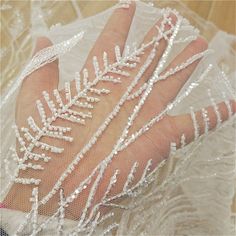 Width: 130 cm (51 inches) If you choose the quantity of 1, you'll get 1 yard. If you choose the quantity of 2, you'll get continuous 2 yards, etc. We offer special discounts for designers and wholesale orders! Very luxury and romantic lace fabric. It can be used for wedding dress, prom dress, bridal gowns, tops, garment fabric, skirts, curtains dolls outfits, shams, lamp shades, veils, costumes, handcraft accessory, and etc... About the shipping, We can offer standard shipping and express shippi Veils Bridal Diy, Diy Gown, Veil Diy, Dolls Outfits, Beaded Lace Fabric, Bridal Dresses Lace, Beaded Leaf, Embroidered Lace Fabric, Garment Fabric