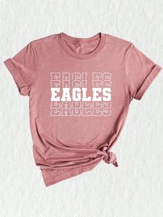 Introducing our Team Mascot Shirt, a must-have for all proud Eagles!  Show off your team spirit and pride with this Eagles School Shirt, designed to celebrate your love for the Eagles and their glorious mascot. This Eagles Mascot Tee is perfect for game days, pep rallies, or simply to represent your team wherever you go. Crafted with premium quality materials, this Eagles Pride Shirt ensures comfort and durability. The soft fabric keeps you feeling cozy, while the vibrant design showcases your l Eagles Shirt Design School Spirit, Eagles Basketball Shirt, Eagle Mascot Shirt Ideas, Elementary School Spirit Shirts Eagles, Eagles School Spirit Svg, Eagles Football Team, Eagles Team, Eagle Mascot, Baby Girl Letters