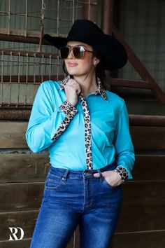 LEOPARD AND TURQ PERFORMANCE RODEO SHIRT (ADULT) – Ranch Dress'n Blue Stretch Shirt For Fall, Fitted Blue Shirt For Fall, Blue Western Tops For Fall, Blue Western Style Tops For Fall, Fitted Long Sleeve Tops For Rodeo, Fitted Tops For Rodeo In Fall, Fitted Blue Western Tops, Blue Western Tops For Rodeo, Blue Fitted Western Tops