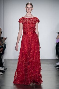 Radiate positive energy with the perfect amount of classiness and sexiness with this bright red, half-sleeved, lace gown. Exclusively designed to make you look as beautiful as a bouquet of red roses, this dress has been hand-embroidered with 3D tissue flowers, and pearls. It’s safe to say this is an haute couture item that you must get your hands on. The cap sleeves with boat neck are undoubtedly the highlight of this fit. In the Spotlight: Bright red color for the classic gown vibe 3D embroider Red Lace Gown, Radiate Positive Energy, Oxford Fashion, Flowers And Pearls, Tissue Flowers, Haute Couture Gowns, French Silk, Haute Couture Dresses, Silk Lace