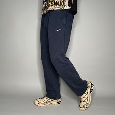 Vintage Nike Sweatpants Dark Navy Blue Cotton White Swoosh Baggy Wide Leg Y2K Skate / Streetwear Great Condition: 9/10 Men's Size: Small My Hands in Pockets = It has Pockets No Hands in Pockets = Does Not Have Pockets Drawstring Will be Visible in Forward Pic, if not Visible it Does Not Have a Drawstring About me: I am 6' 0" for reference I generally wear a Large (32" inseam) I Model XS to 2XL sweatpants, I find that you can often size up or down with 95% of sweatpants and they fit the same Casual Wide Leg Sweatpants For Sports, Casual Wide-leg Sweatpants For Sports, Blue Joggers For Leisure In Sportswear Style, Casual Baggy Sweatpants For Sports, Casual Wide Leg Joggers For Sports, Baggy Blue Sweatpants For Sports, Blue Baggy Sweatpants For Sports, Blue Baggy Athleisure Sweatpants, Casual Blue Sweatpants For Leisure