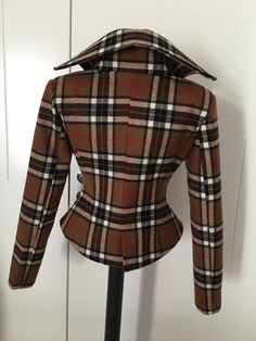 "This is a very stylish and elegant wool plaid jacket . Leght 58 cm - at back. made of very soft and high quality woolen fabric. The jacket is fully lined. SIZE CHART SIZE S - US 6, UK 8, EU 36 bust: bust around 34.5\"/90cm Waist: waist around 27.5\"/70cm Hips: hips around 34.5\"/90cm SIZE M - US 8, UK 10, EU 38 bust: bust around 37.5\"/95cm Waist: waist around 29.5\"/75cm Hips: hips around 37.5\"/95cm SIZE L - US 10, UK 12, EU 40 bust: bust around 39.5\"/100cm Waist: waist around 31.5\"/80cm Hi Fitted Wool Tweed Jacket With Long Sleeves, Fitted Houndstooth Tweed Jacket With Lapel Collar, Fitted Tweed Wool Coat With Long Sleeves, Elegant Plaid Wool Outerwear, Fitted Houndstooth Tweed Jacket With Long Sleeves, Fitted Long Sleeve Houndstooth Tweed Jacket, Fitted Tweed Wool Coat, Plaid Wool Coat With Long Sleeves, Winter Plaid Wool Tweed Jacket