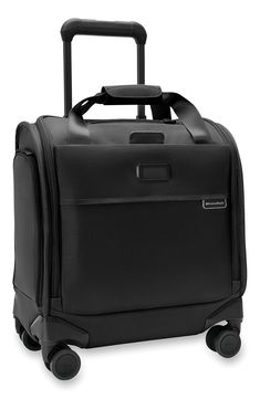 This small carry-on bag is designed for easy packing, effortless transport and will fit under most airline seats and overhead compartments.Closure: The zip-around closure features self-repairing YKK zippers with lockable double pulls.Exterior features: The ballistic nylon exterior resists wear, moisture, dirt and abrasion, and proprietary shock-absorbing spinner wheels offer 360-degree movement and quiet gliding. Outsider® handle provides optimal capacity and a ﬂat packing surface inside to mini Elegant Luggage For Overnight Trips, Black Luggage With Top Carry Handle For Business Trips, Modern Luggage With Top Carry Handle For Overnight Trips, Rectangular Nylon Travel Bag For Business Trips, Nylon Travel Bag For Business Trips, Elegant Black Luggage For Overnight Trips, Classic Nylon Travel Bag With Luggage Sleeve, Functional Luggage With Zipper For Business Trips, Modern Luggage With Sleeve For Overnight Trips