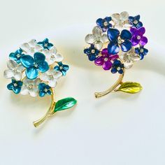 When summer arrives, wear this elegant endless summer Hydrangea Flower Brooch. Hydrangea represents gratitude and grace. Add a touch of beauty and sophistication to any outfit with this versatile accessory. Perfect for dresses, coats, short sleeves, hats, bags, and shawls. Elevate your style with this stunning floral brooch pin. Dimensions: 3.5cm*5cm Materials: Alloy, rhinestone Summer Hydrangea, Dresses Coats, Endless Summer Hydrangea, Floral Brooch, Hydrangea Flower, Endless Summer, Summer Jewelry, Flower Brooch, Hydrangea